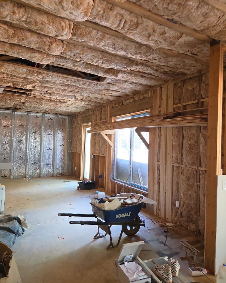 A basement stripped to the framing after water damage